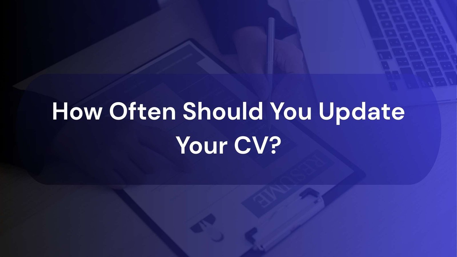 A professional person reviewing and updating their CV on a laptop, symbolizing career growth.